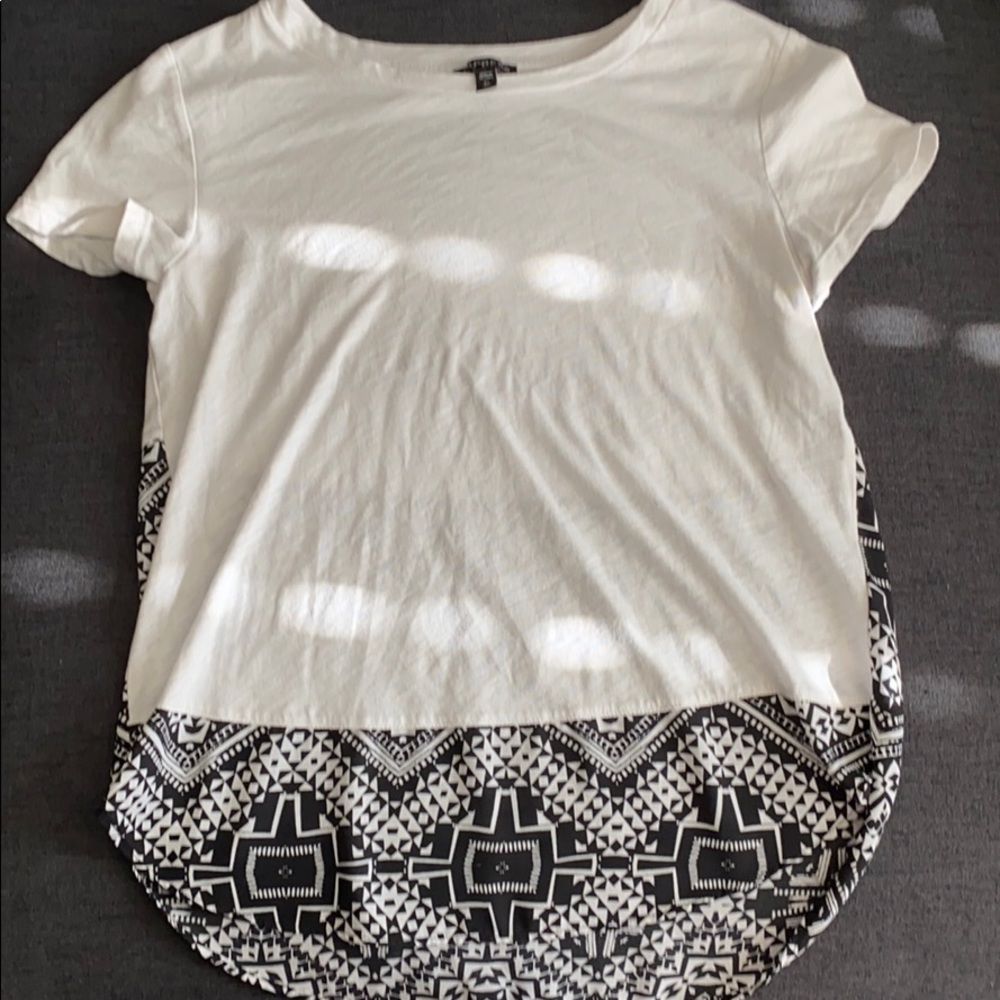 White top with black and white design